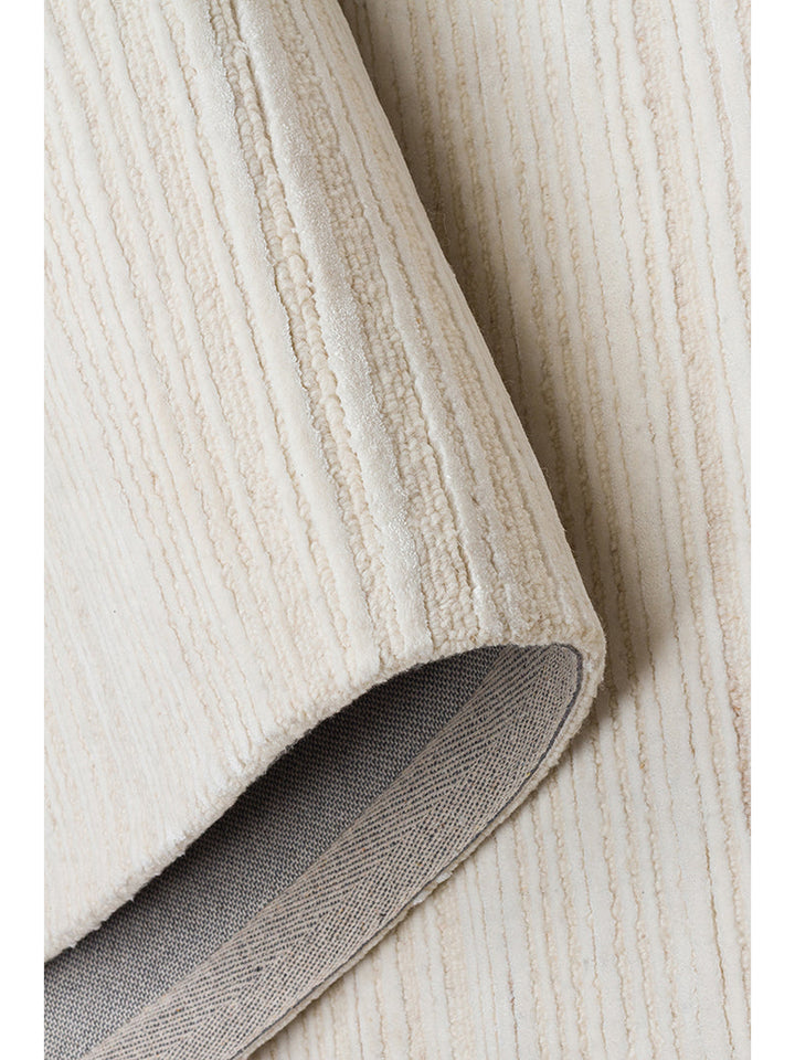 Tappeto tessuto a mano in misto lana e TENCEL™ della serie Palermo CREAM